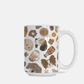 White mug with brown dog illustrations on a white background