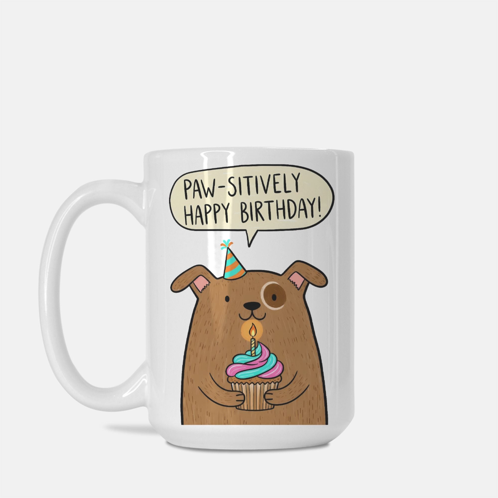 Mug with a cartoon dog holding a birthday cupcake and a speech bubble saying 'Paw-sitively Happy Birthday!' on a white background.
