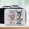 Black lunch box with cartoon mouse and donkey design and text 'I Don't Give A' on a light background.