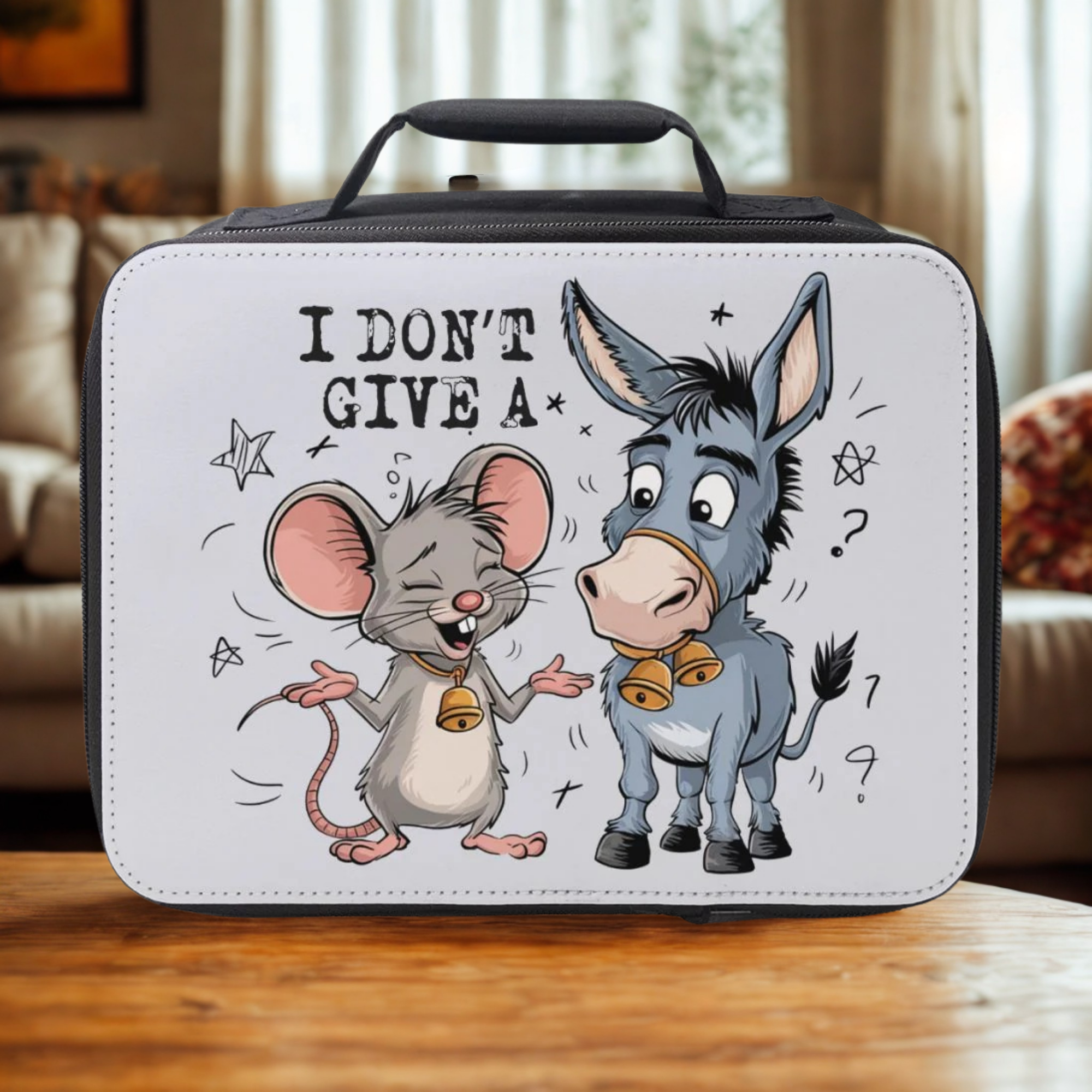 Lunch bag with cartoon mouse and donkey design on a wooden coffee table.