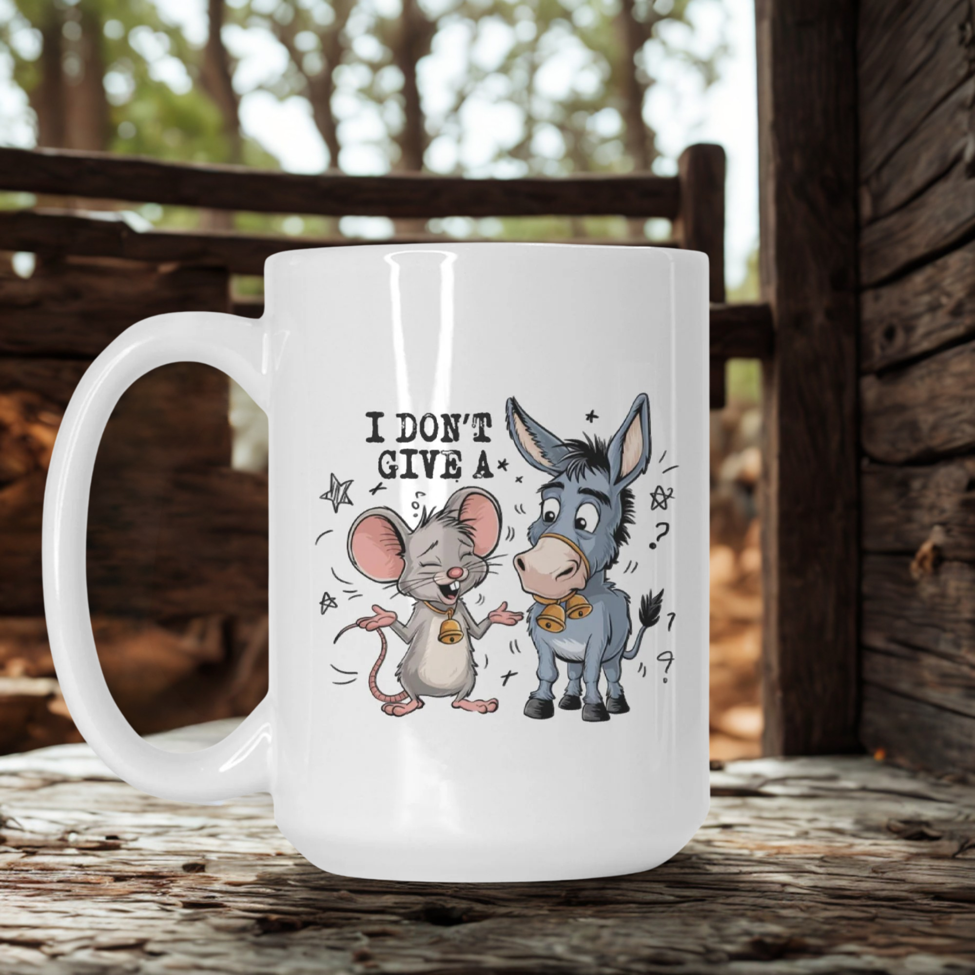 White mug with cartoon mouse and donkey design on a wooden surface