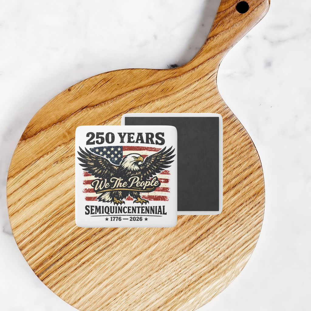 Semiquincenntennial porcelain magnet with eagle design on a wooden cutting board