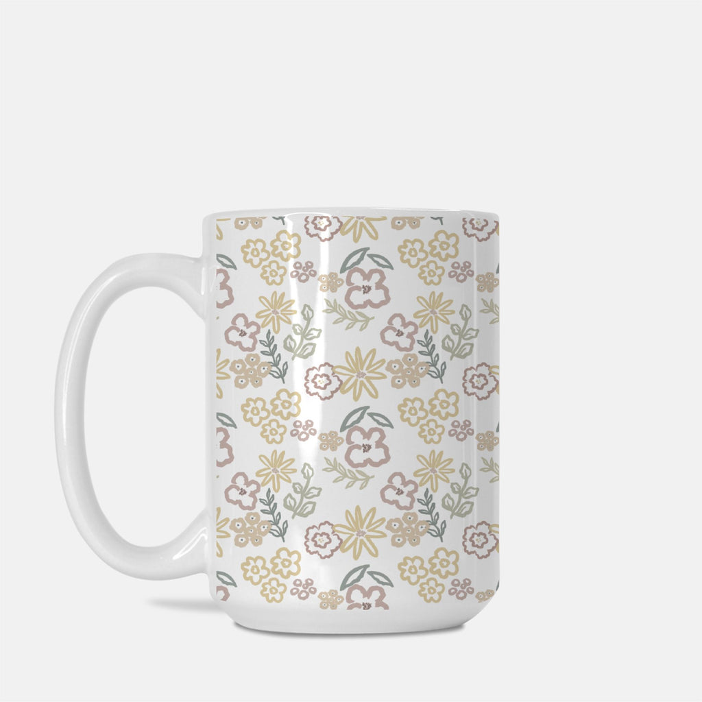 White mug with floral pattern on a white background