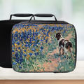 Rectangular lunch box with a dog and floral design on a blurred background