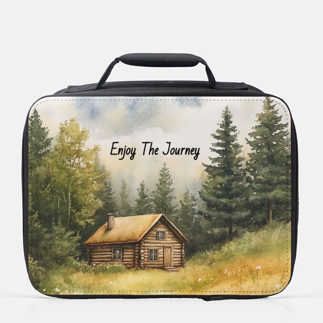  insulated lunch bag with a cabin and trees design and 'Enjoy The Journey' text