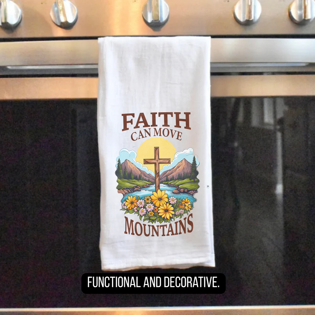 Decorative tea towel with cross and nature design hanging on a stove handle