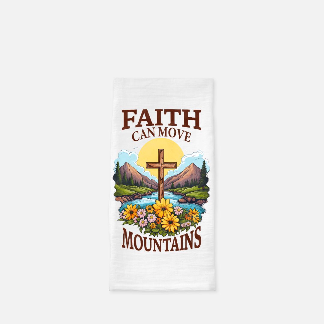 white tea towel with cross, mountains, and flowers with 'Faith Can Move Mountains' text on a white background