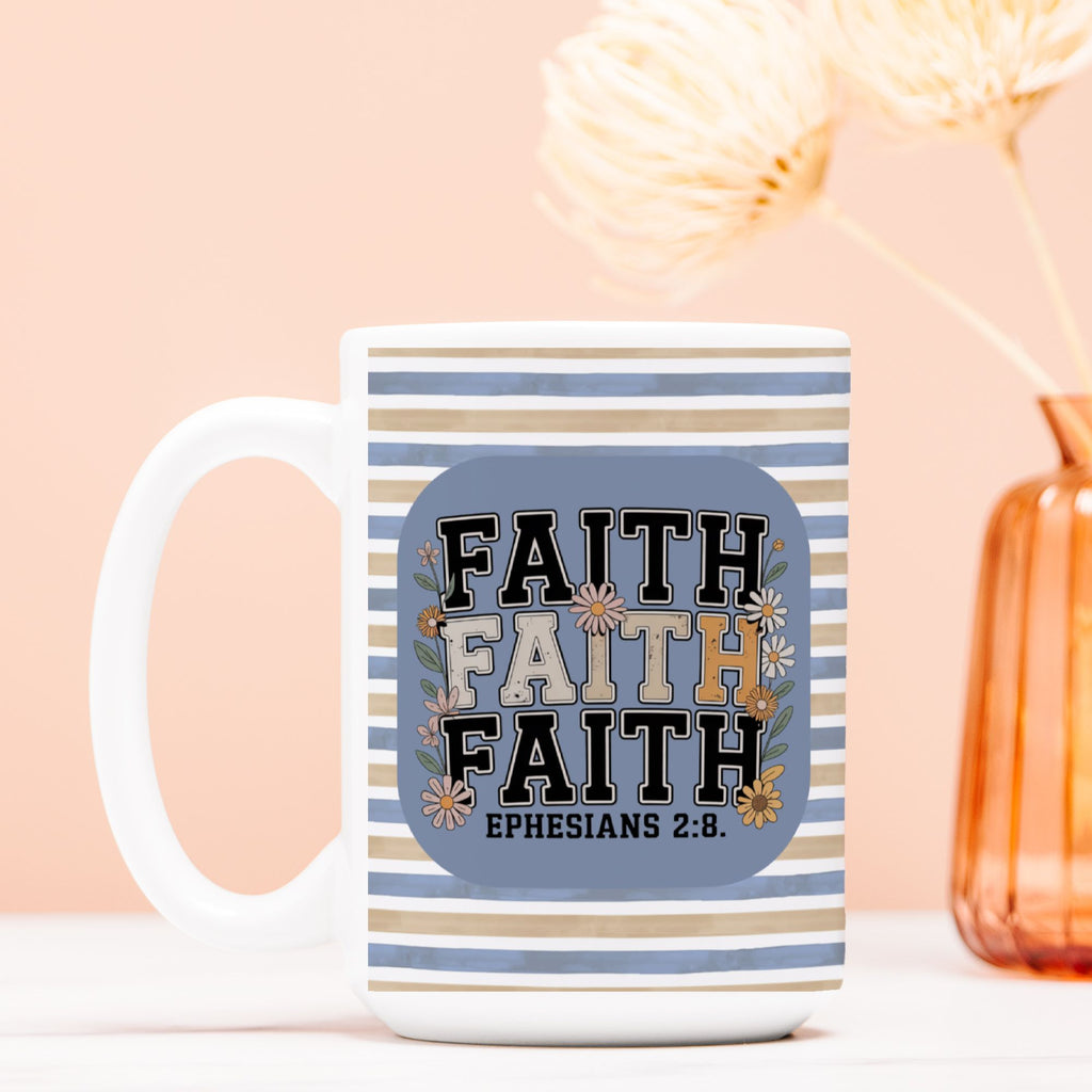 Mug with 'FAITH' text and stripes on a light background