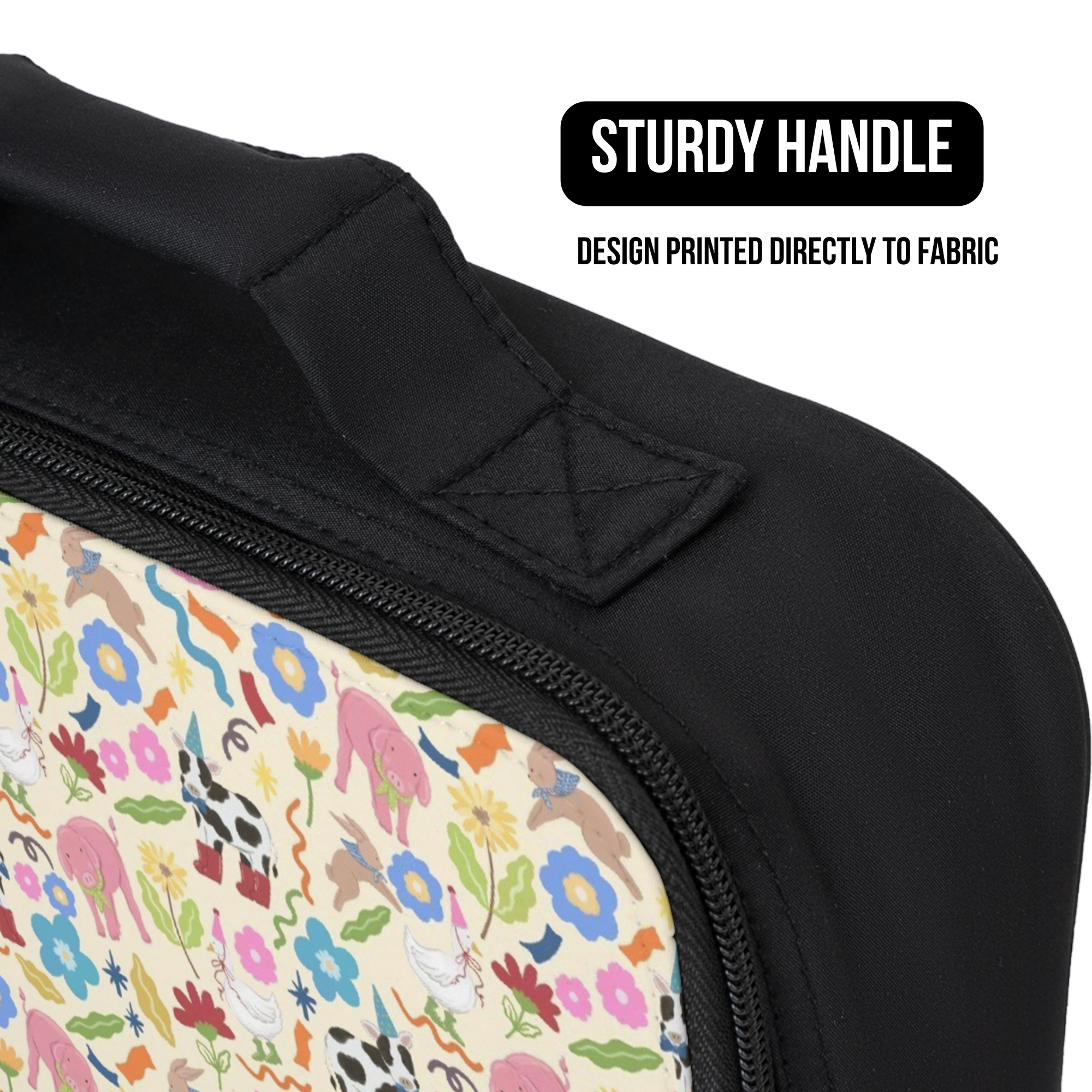 Lunch bag with a colorful animal pattern and black handle on a white background with labels 'Sturdy Handle' and 'Design Printed Directly To Fabric'