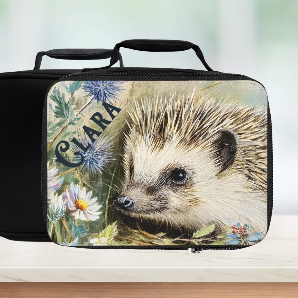 Black lunch bag with hedgehog design and 'Clara' text on a white background