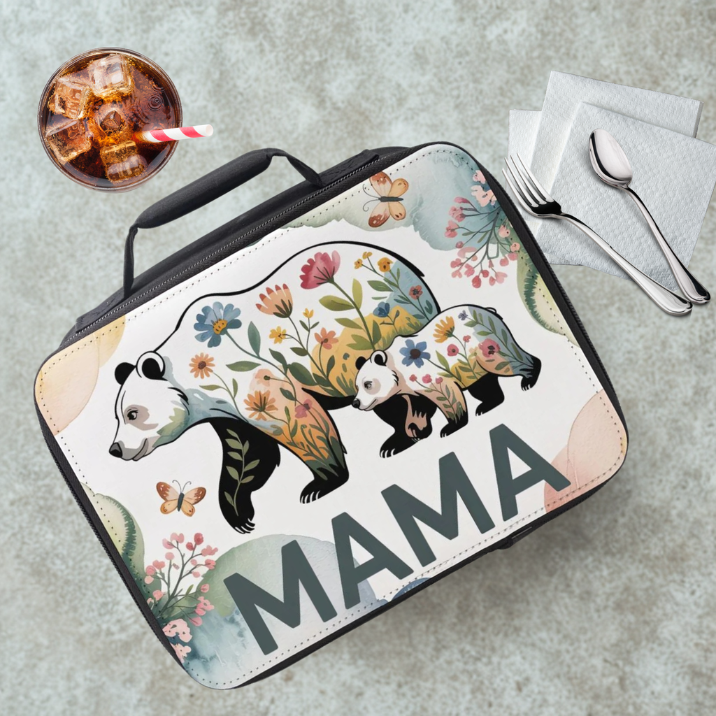Floral panda design on a lunch bag with 'MAMA' text, placed on a table with a drink and utensils.