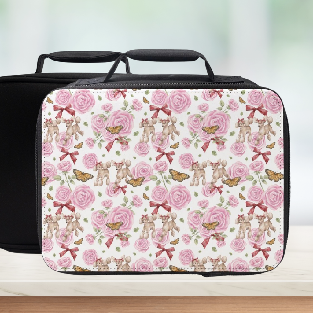 Lunch bag with poodle dogs and floral pattern on a light background
