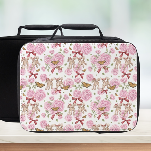 Lunch bag with poodle dogs and floral pattern on a light background
