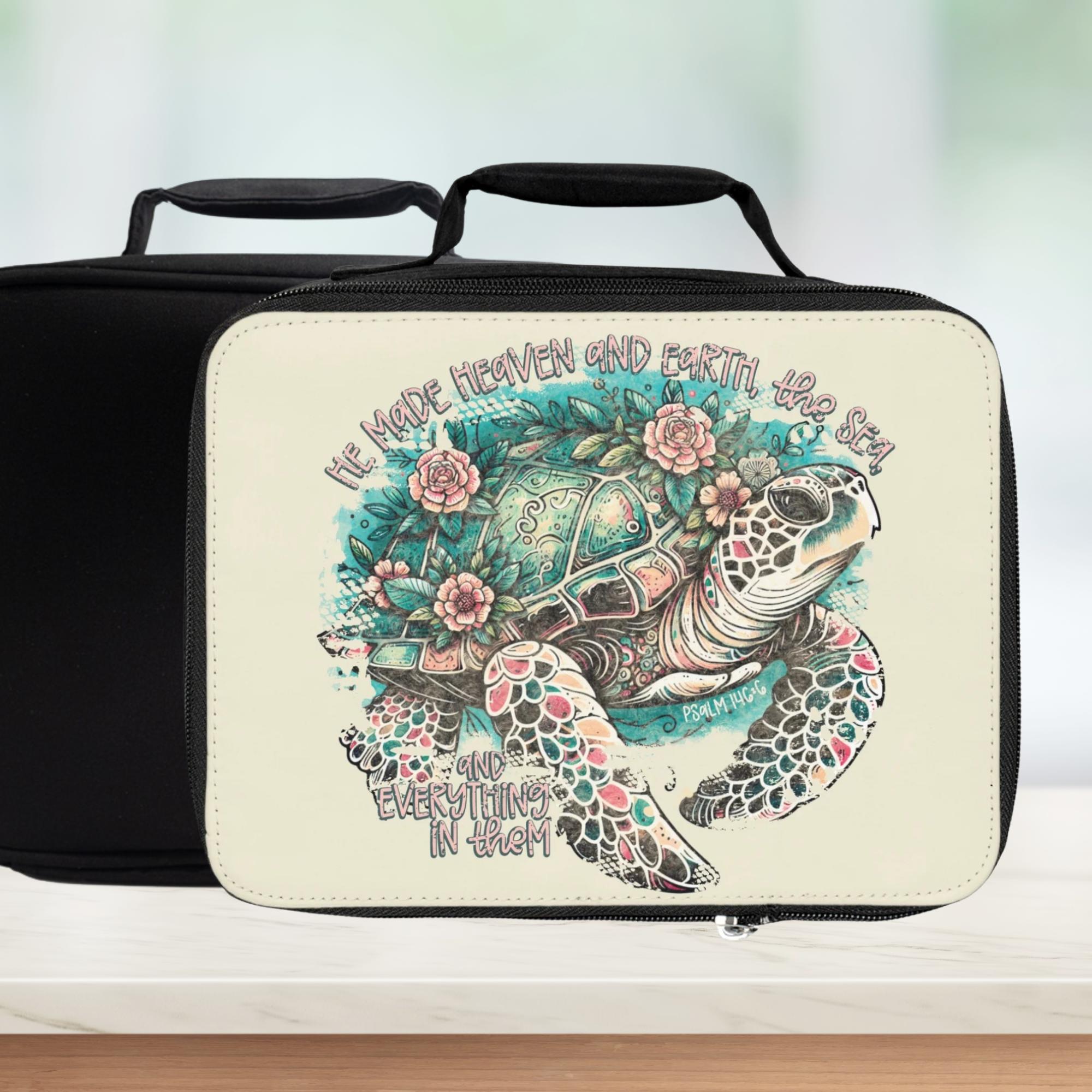  insulated lunch bag with turtle design and quote on a white background