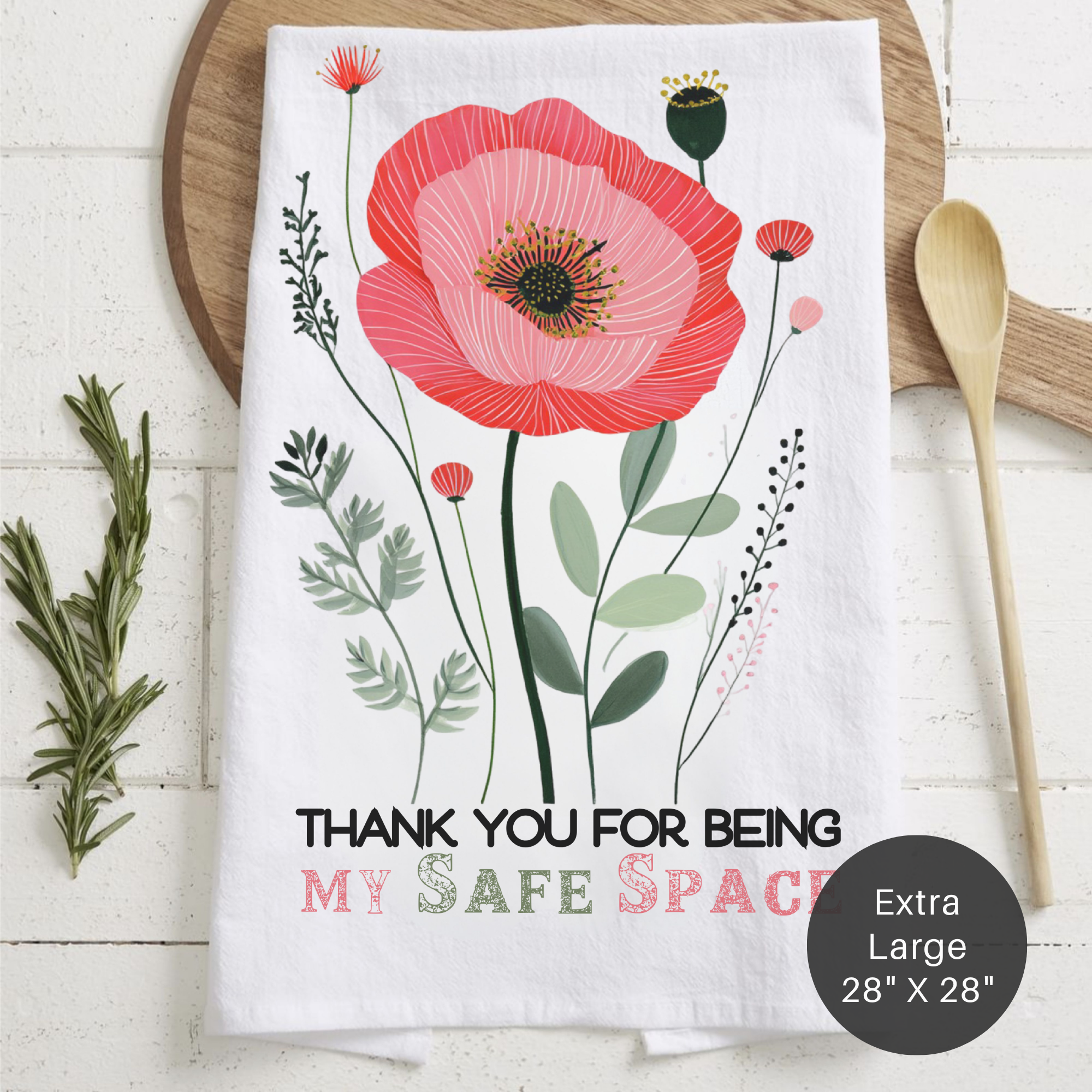 Floral-themed towel with text 'Thank You For Being My Safe Space' on a wooden surface