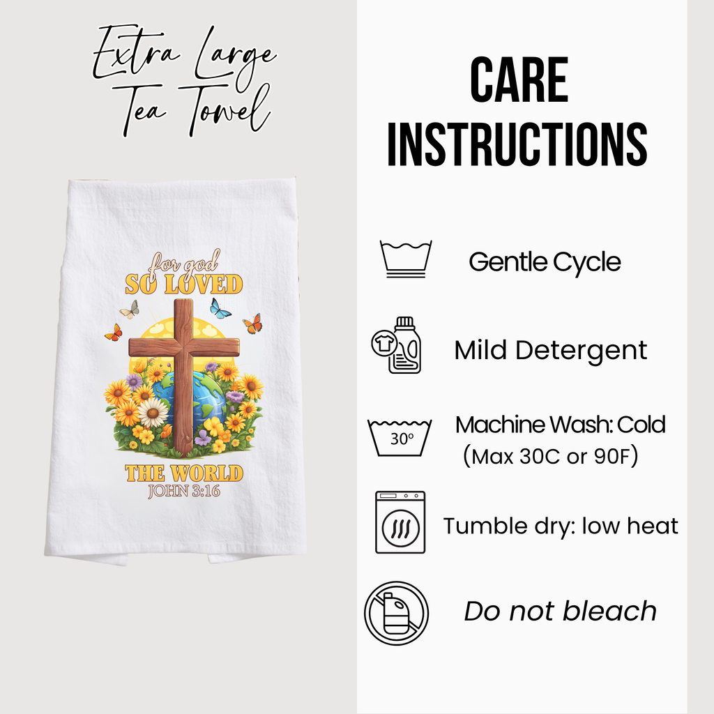 White tea towel with a cross and flowers design, featuring care instructions on a white background.