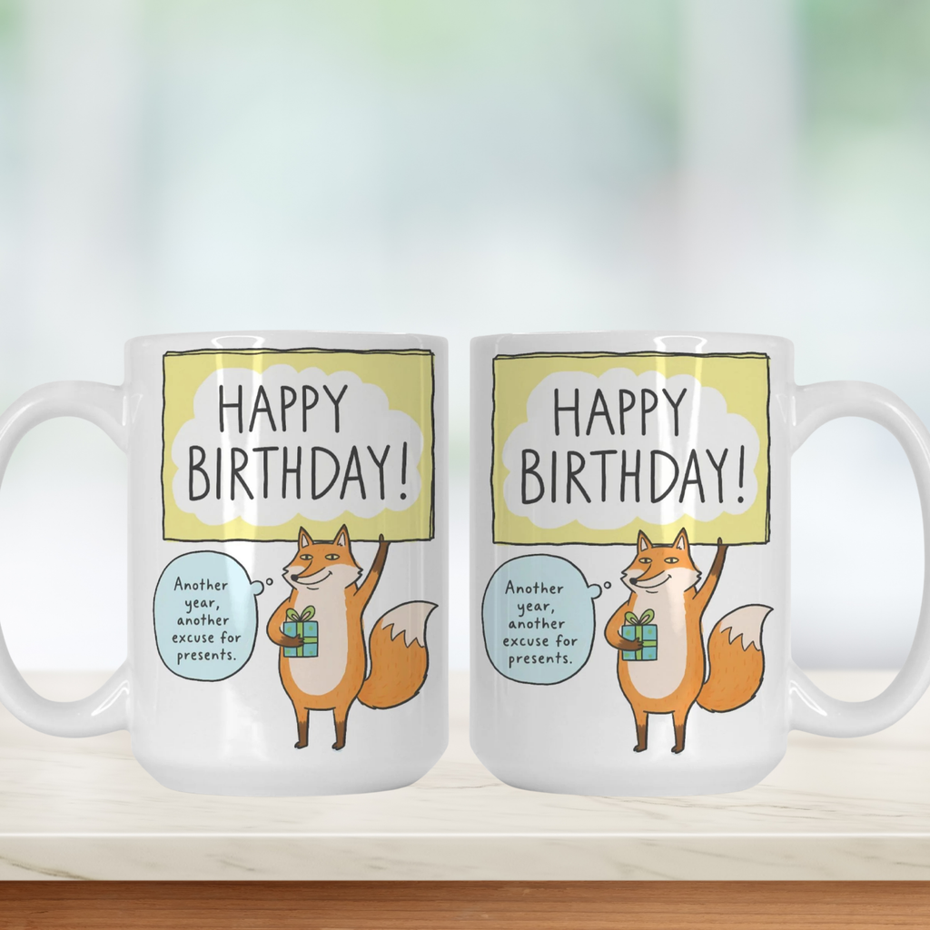 Two mugs with fox illustrations and 'Happy Birthday!' text on a white background