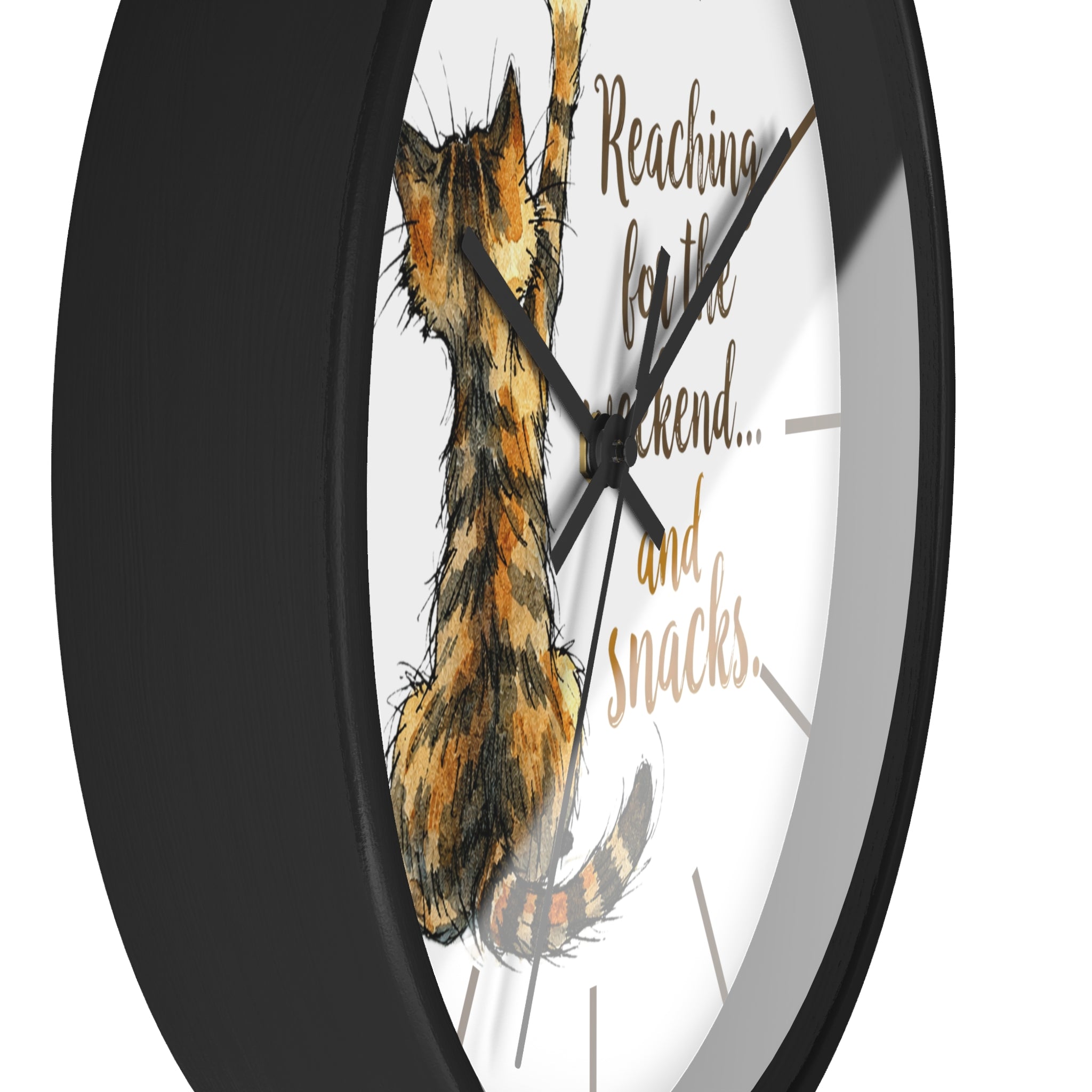 Side view of a round black wall clock with a cat illustration and text on a white background