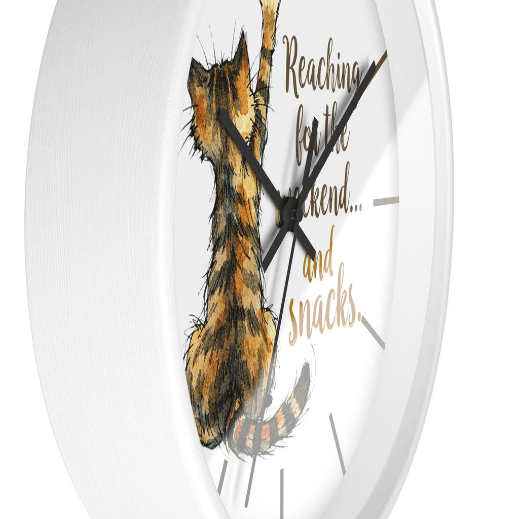 Side view of a round white wall clock with a cat illustration and text on a white background