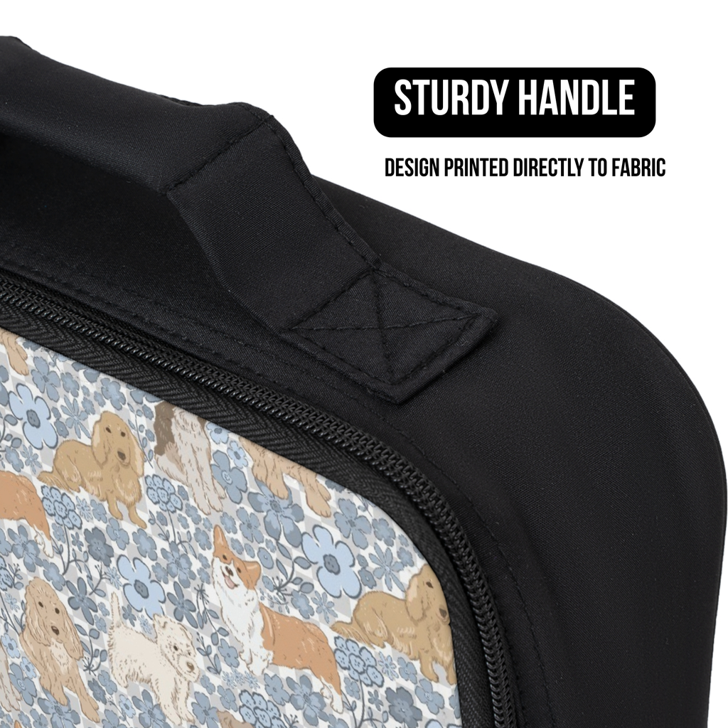 Black lunch bag with a floral pattern featuring dogs and a sturdy handle, labeled 'Design printed directly to fabric'.