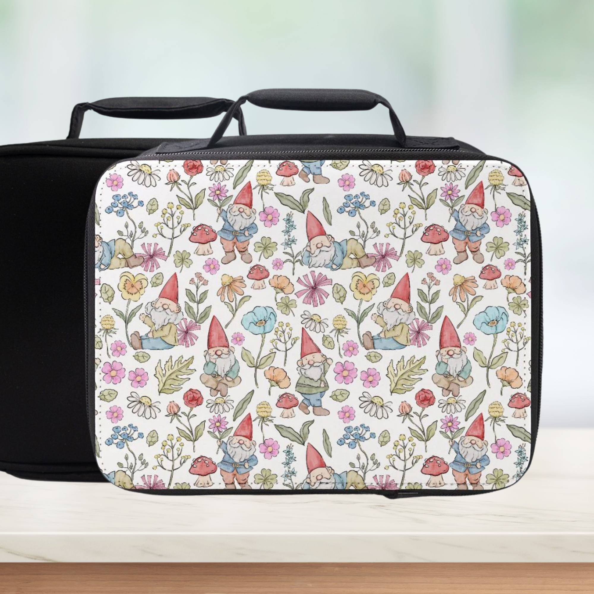 Insulated lunch bag with a colorful pattern of gnomes and flowers on a white background