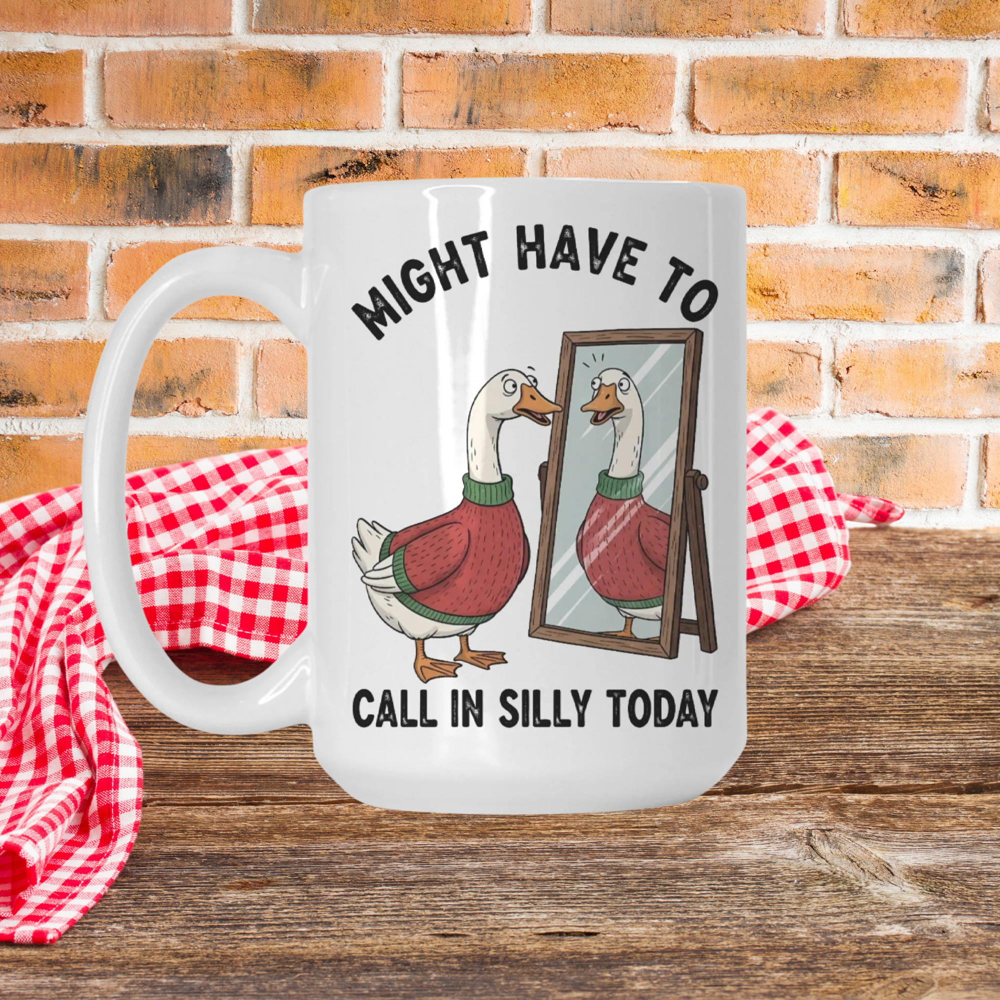 Mug with goose illustration and text on a wooden picnic table with a brick wall background