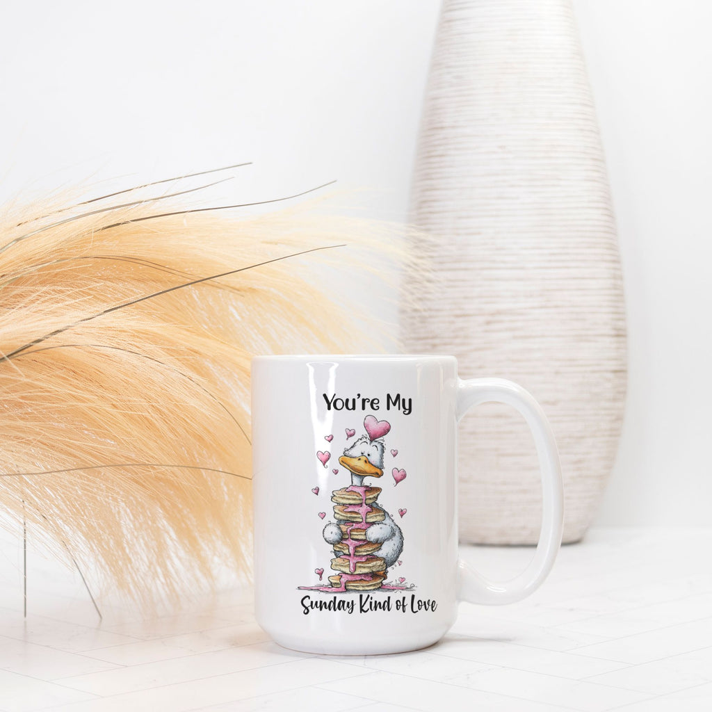 White mug with cartoon character and text on a white background