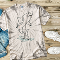 Tie-dye t-shirt in the color Spider Silver with hand drawn shark design on a wooden surface with jeans and shoes.