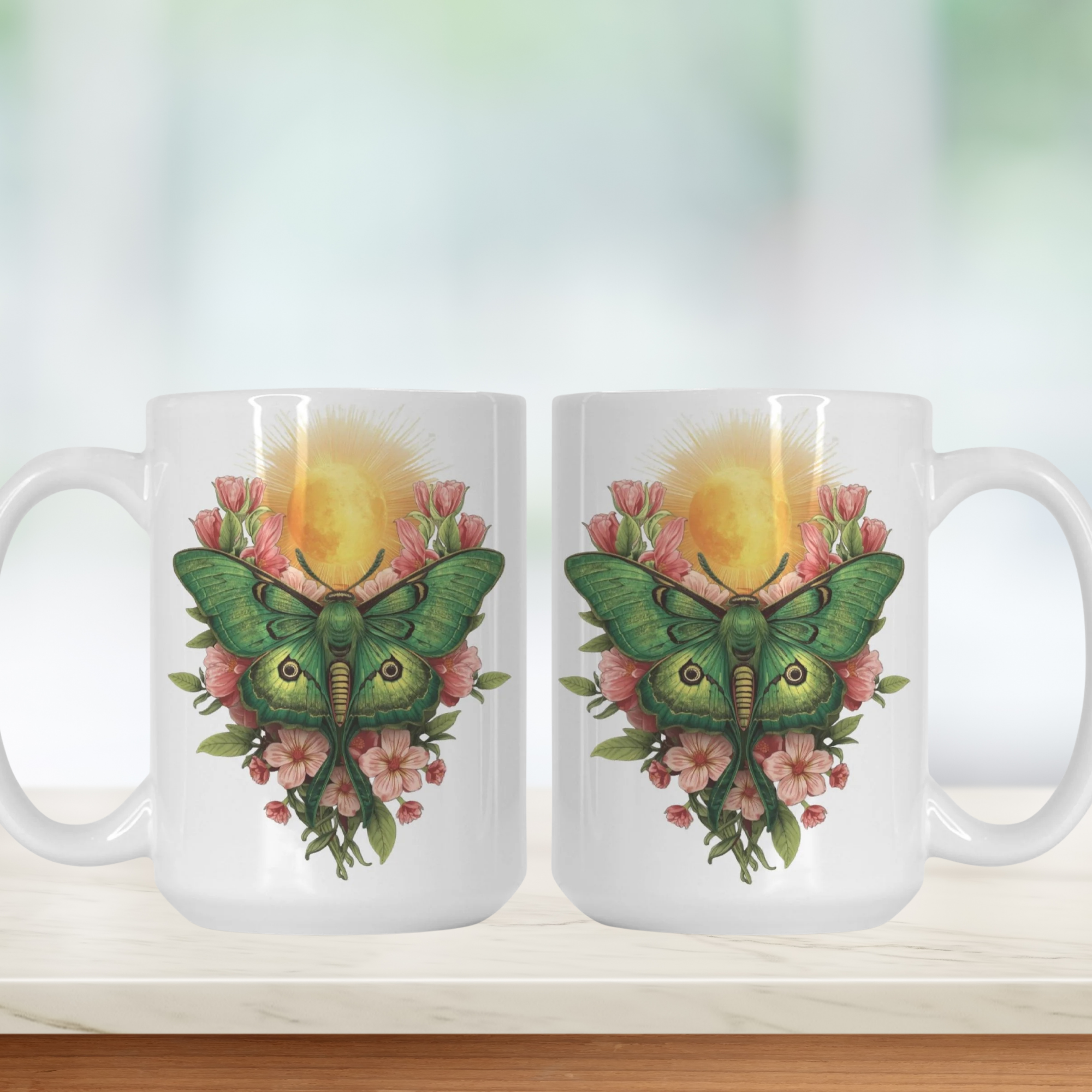 Two white mugs with a green butterfly and floral design on a white background