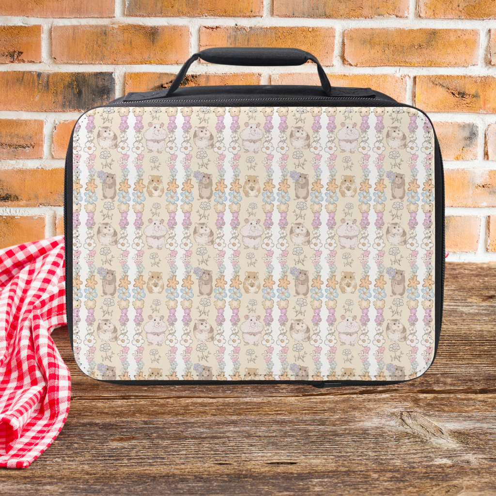 Hamster patterned lunch bag on a wooden surface with a brick wall background