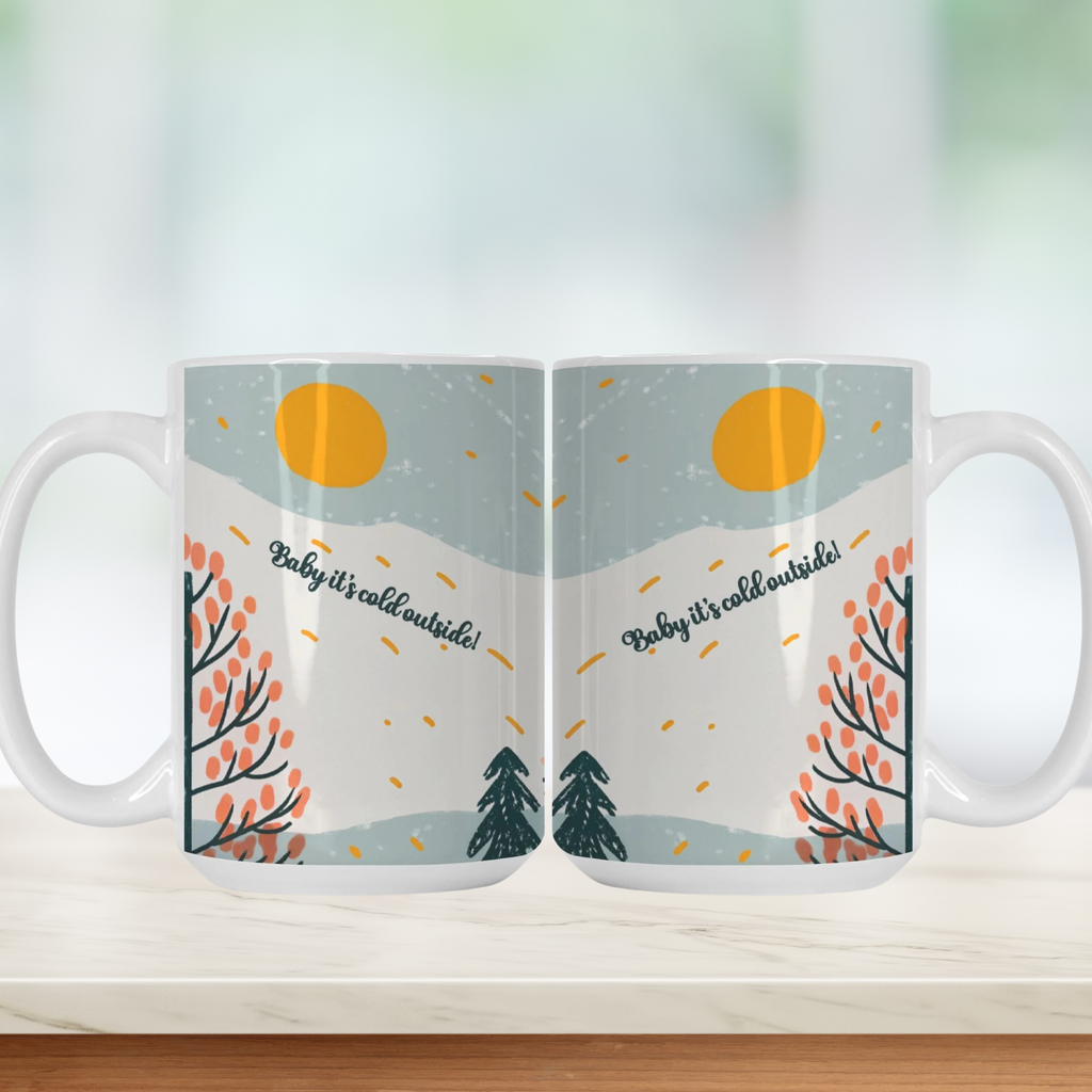 Two mugs with a winter scene design on a white surface.