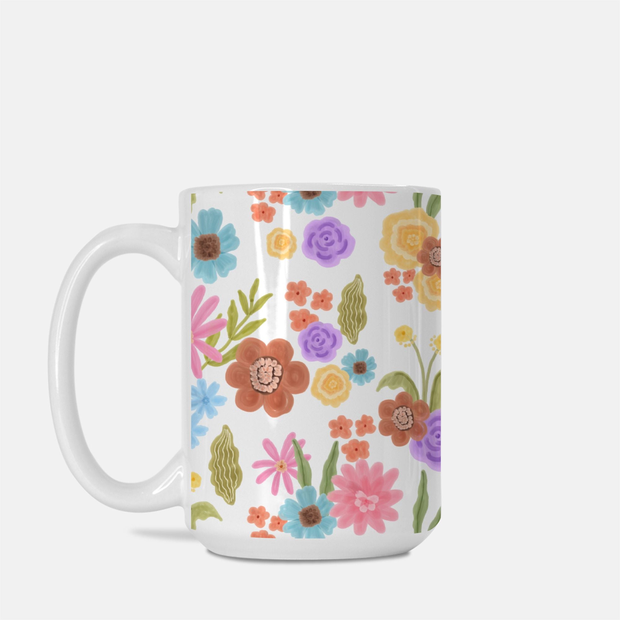 White mug with colorful floral pattern on a white background