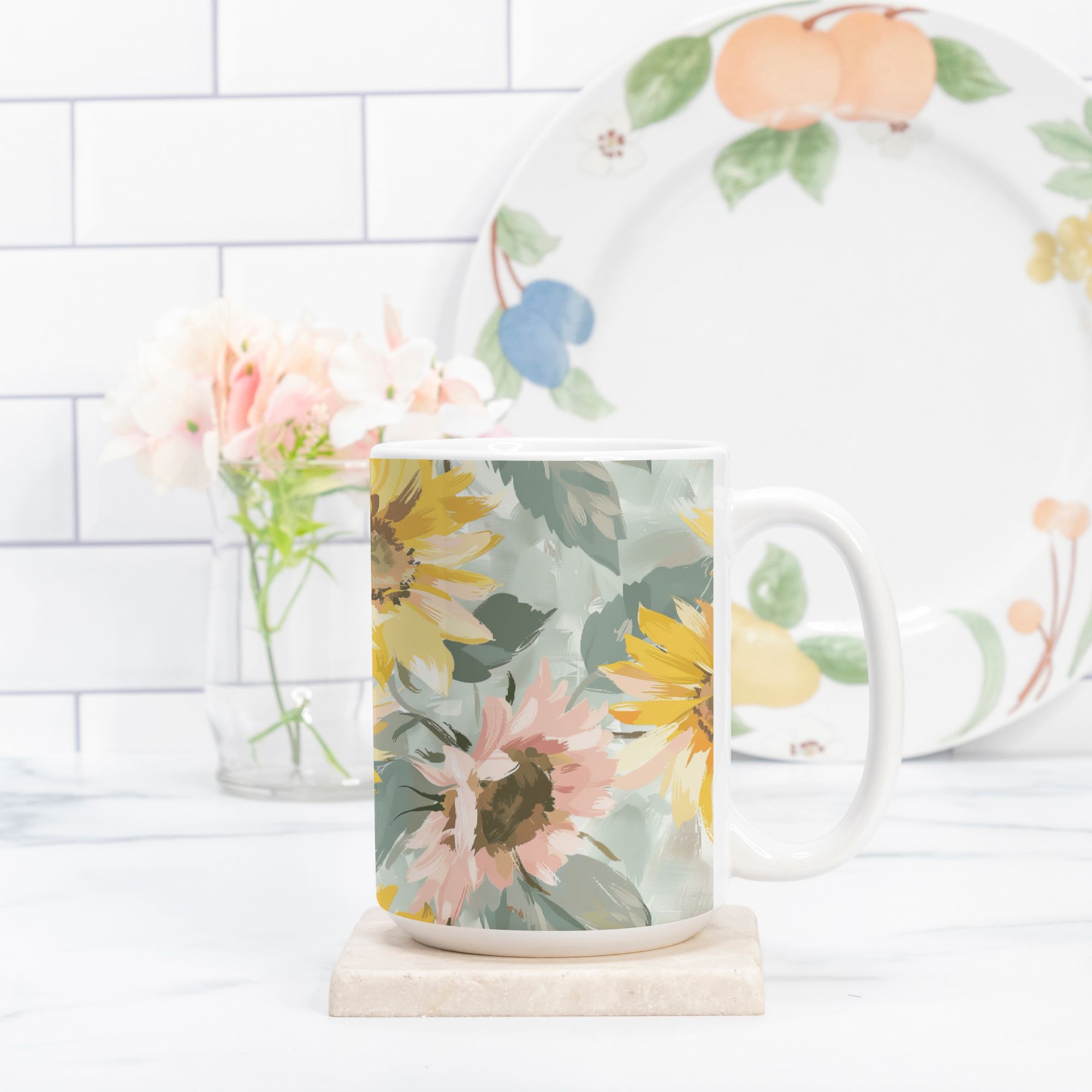 Floral mug and plate on a kitchen counter with a white tiled wall background