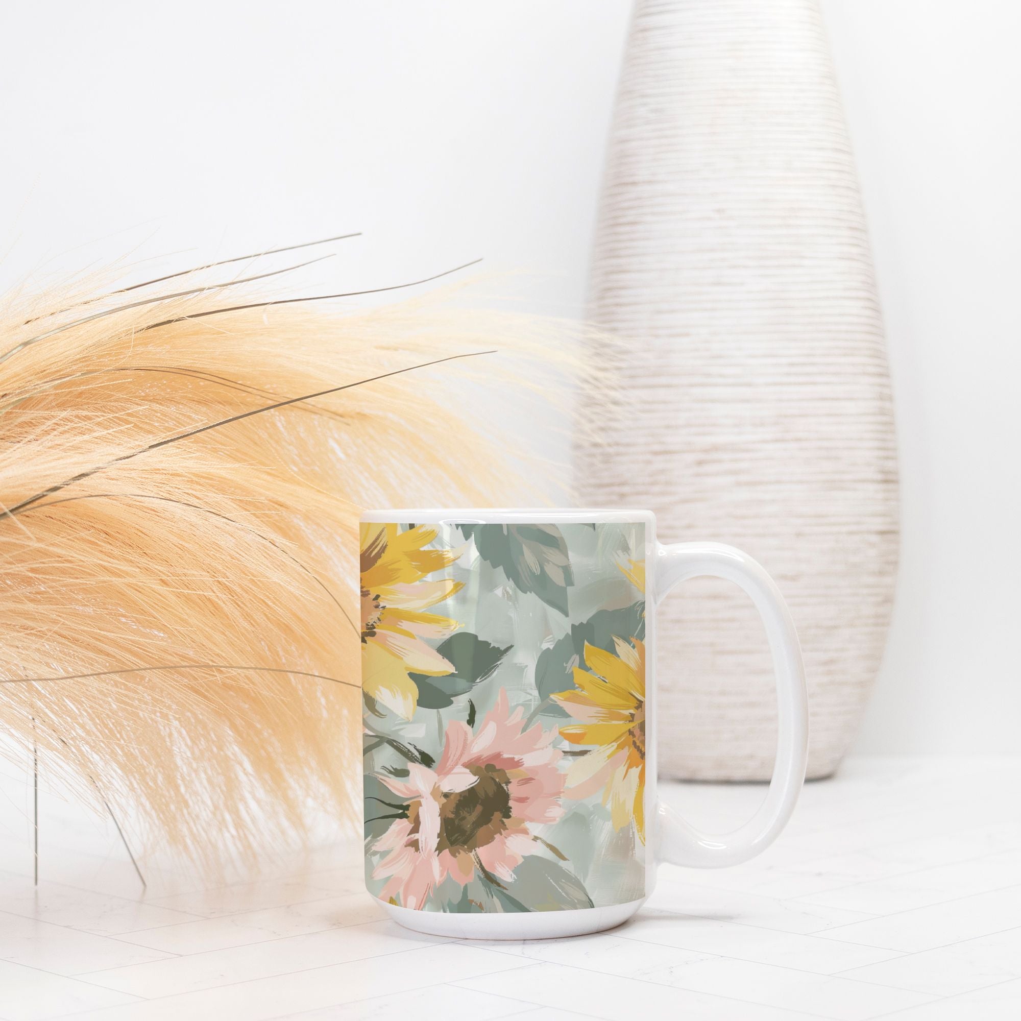 Floral mug on a white surface with decorative elements