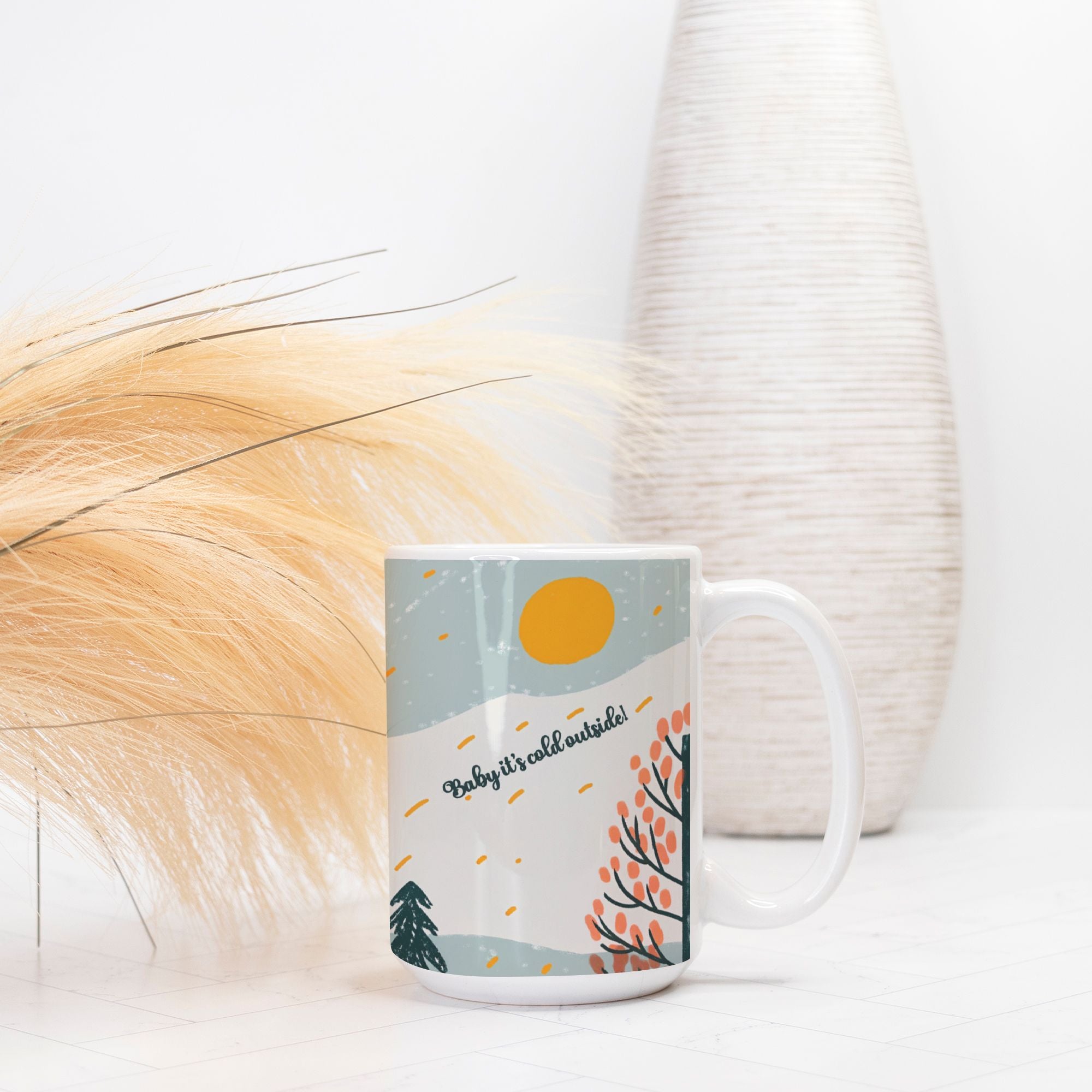 Mug with a winter scene design on a white surface