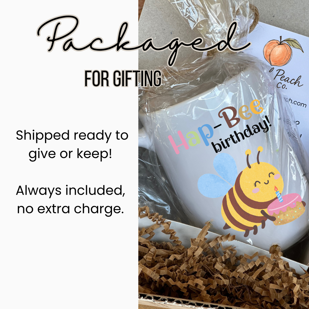 Gift-wrapped mug with bee design and 'Peach Co' branding, text indicating packaged for gifting.