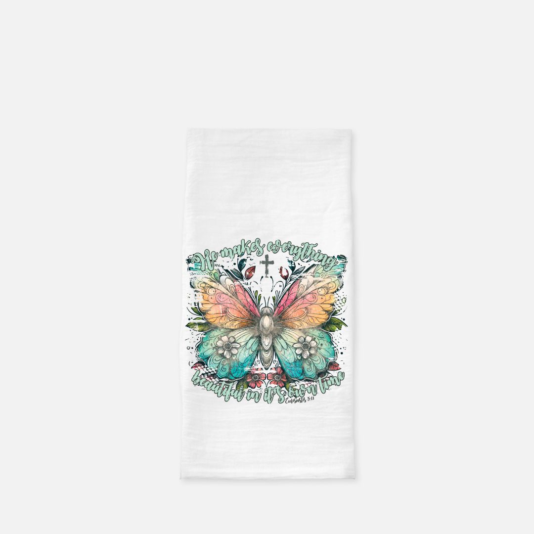 Tea towel with butterfly design with text on a white background