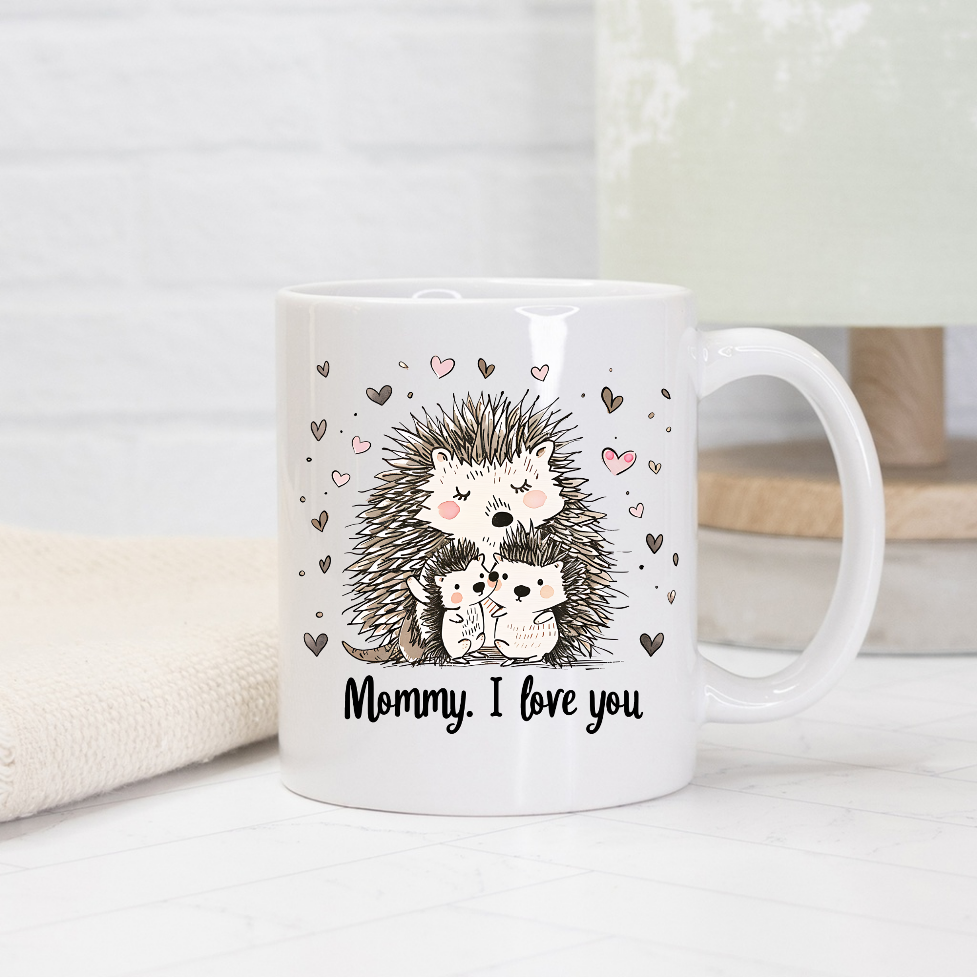 11oz white mug with hedgehog illustration and 'Mommy, I love you' text on a light background