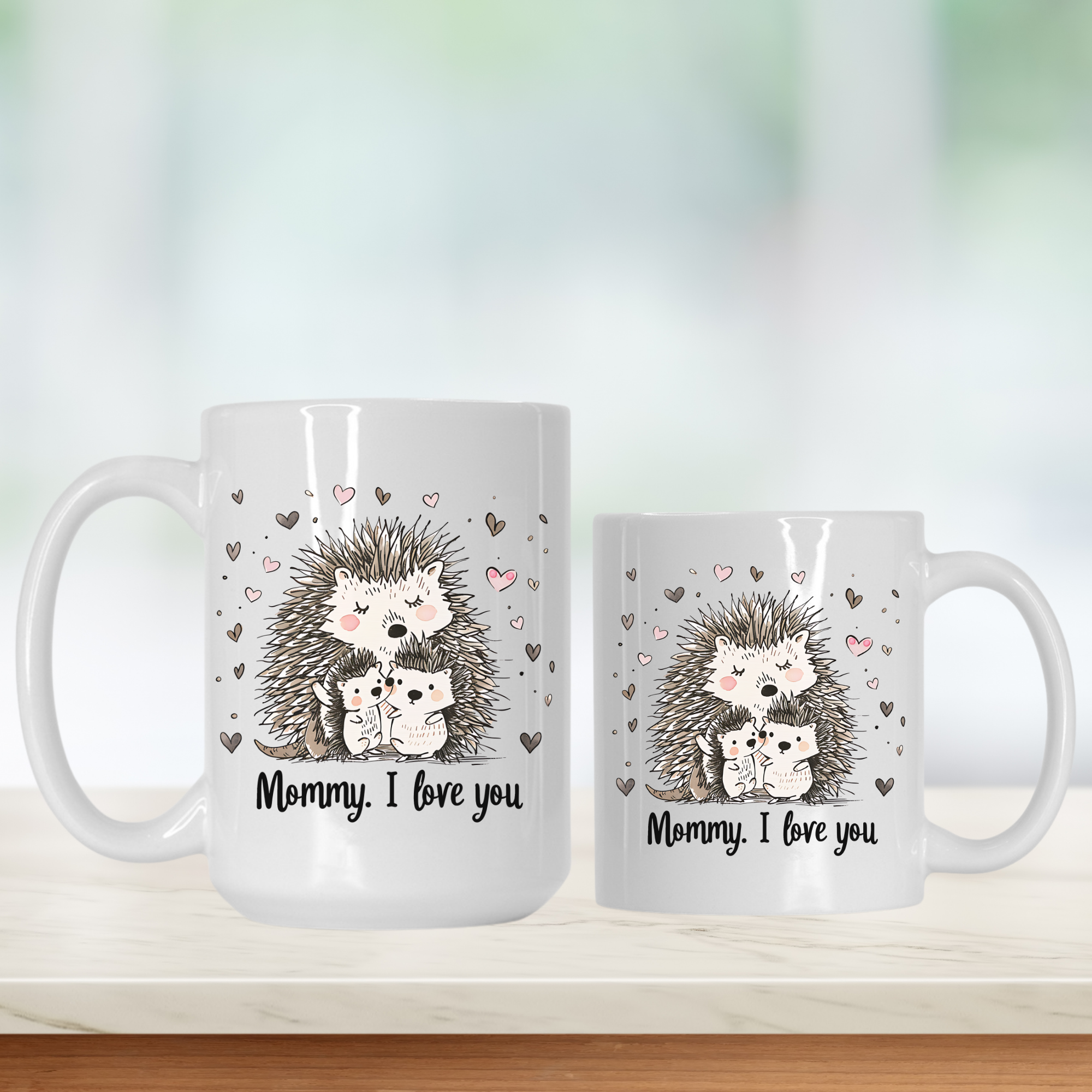 15oz & 11oz mugs with hedgehog design and text 'Mommy, I love you' on a white background