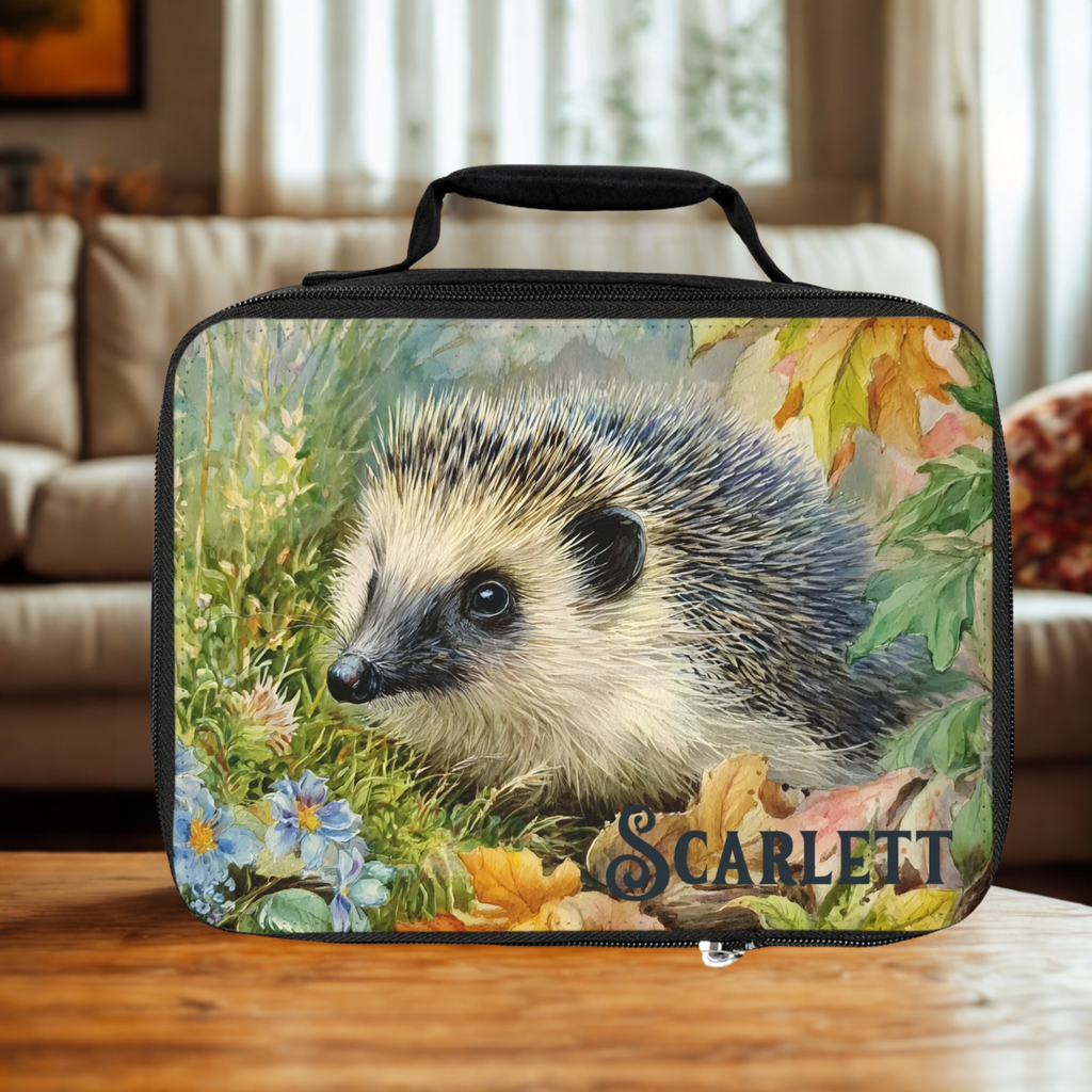  insulated lunch bag with a hedgehog design and 'Scarlett' personalized text on a living room table.