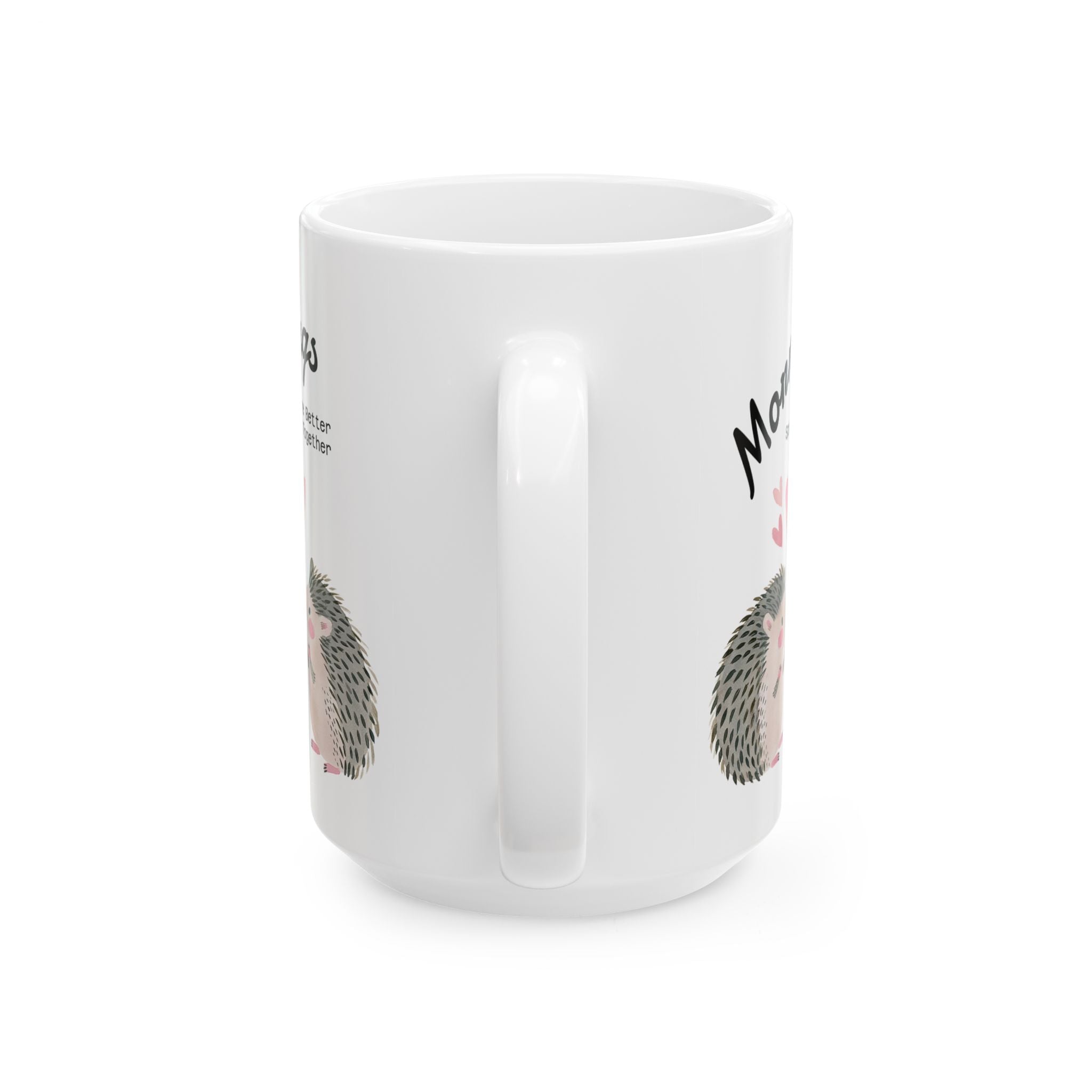 Handle view of a 15oz ceramic mug with a hedgehog couple design.