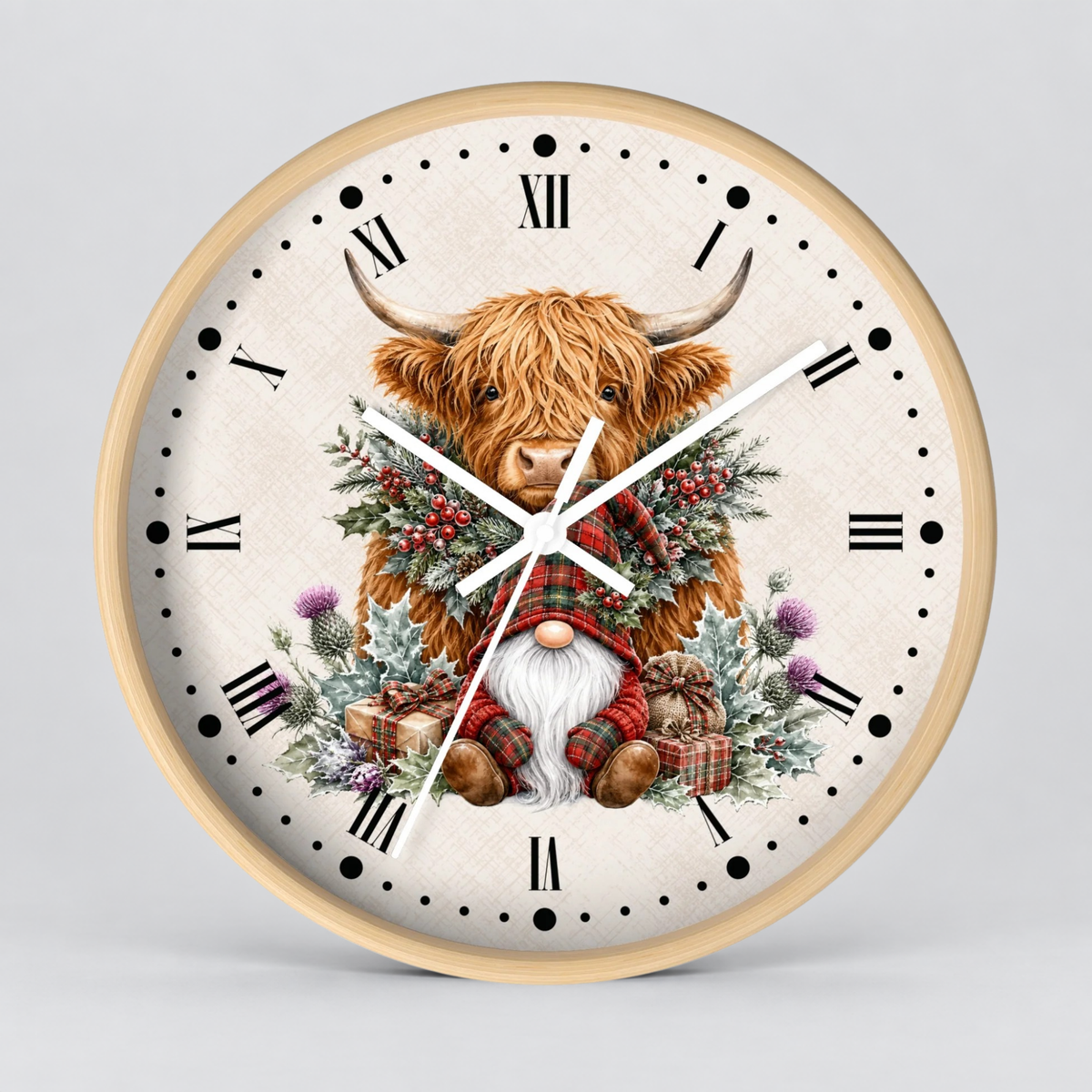 Round wall clock with a light wood frame and a cream-colored face, featuring a detailed illustration of a Highland cow with a plaid sweater and a gnomem, surrounded by festive greenery and gifts.