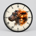 Round wall clock with a black frame and a printed face featuring a hippopotamus head merging into an orange sunset landscape scene on an off-white background with black Roman numerals.