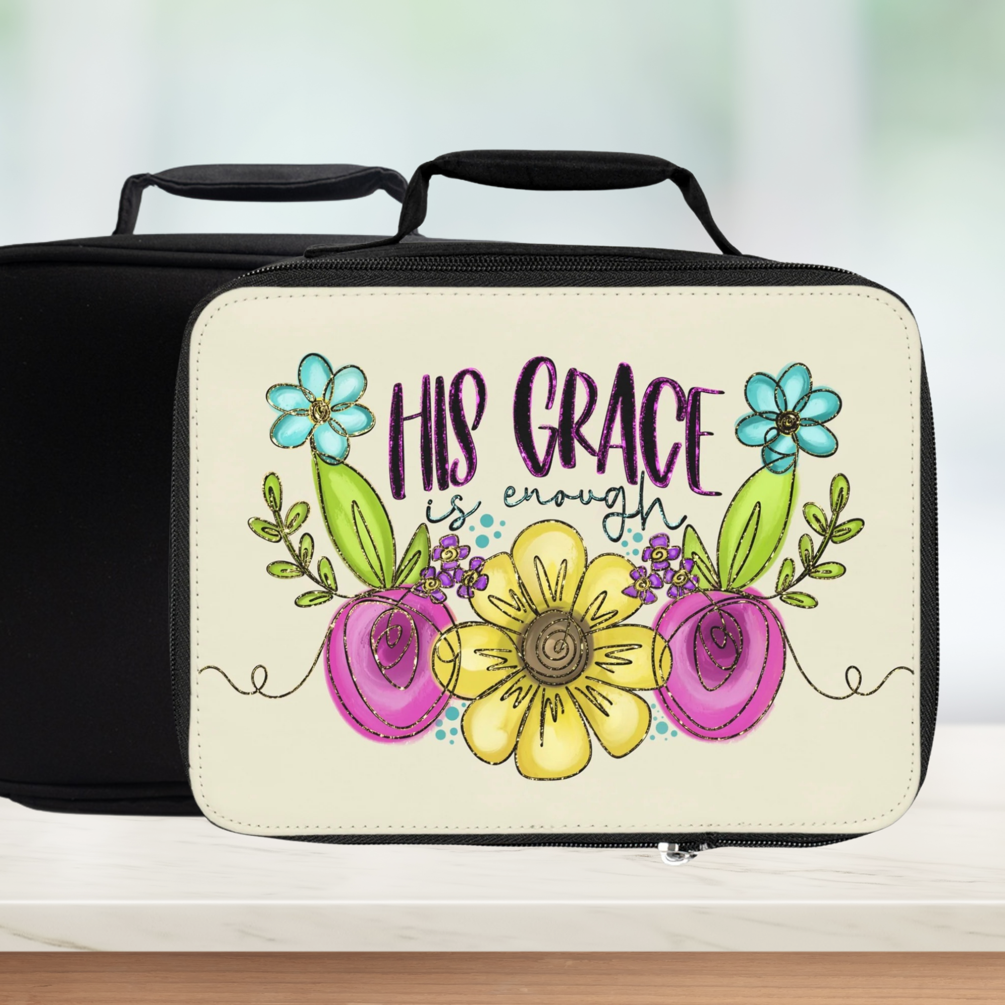  insulated lunch bag with floral design and 'His Grace is Enough' text