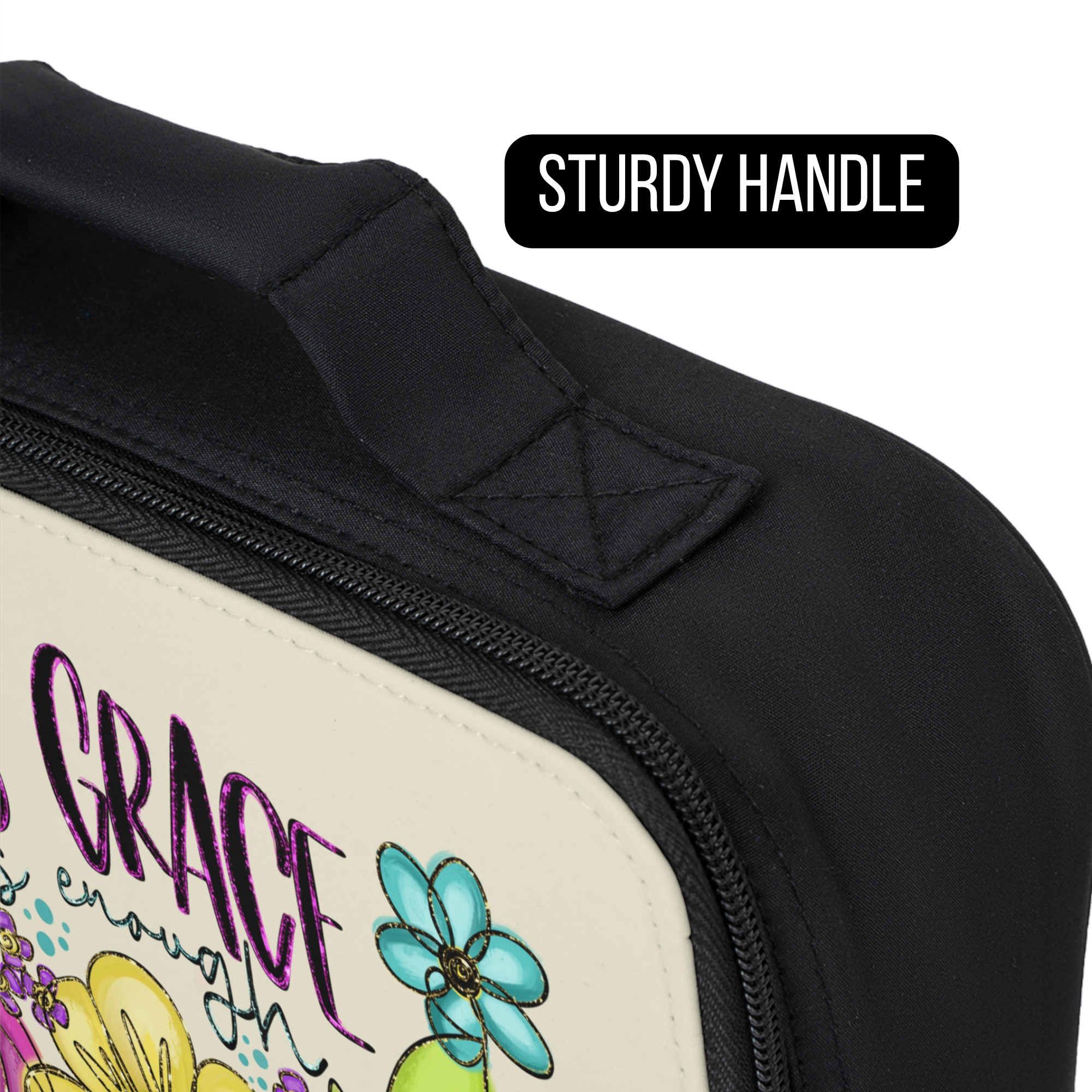 Black lunch bag with floral design and text, highlighting a sturdy handle.