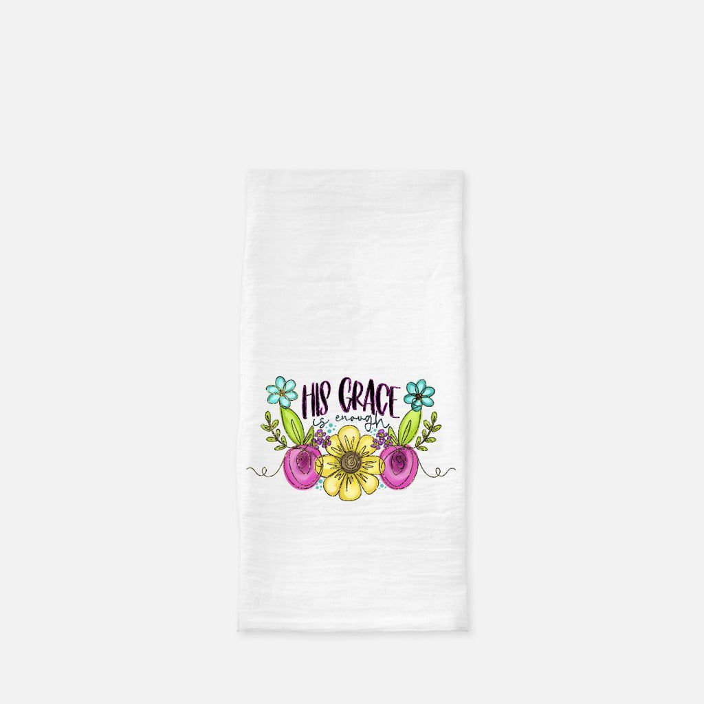 White tea towel with floral design and 'His Grace is Enough' text on a white background