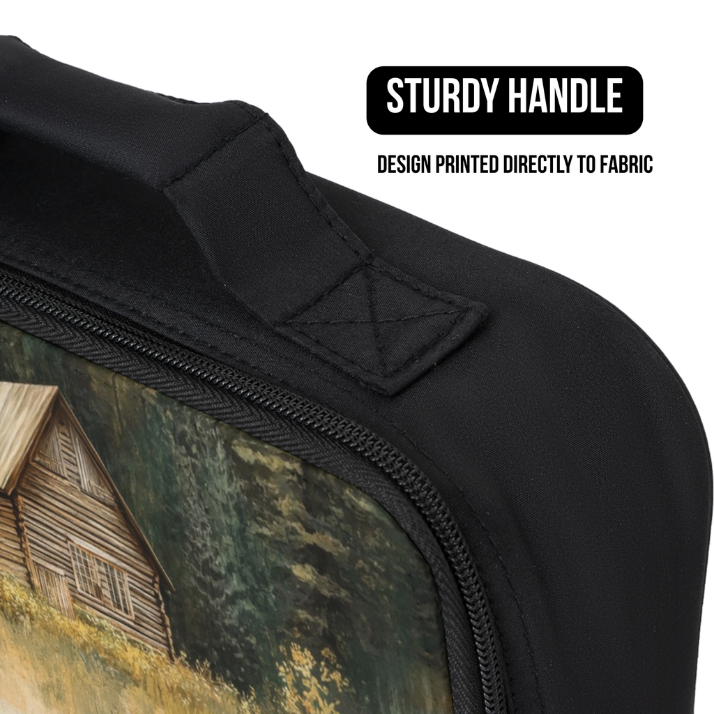Black lunch bag with a printed design of a cabin in the woods, featuring a sturdy handle.