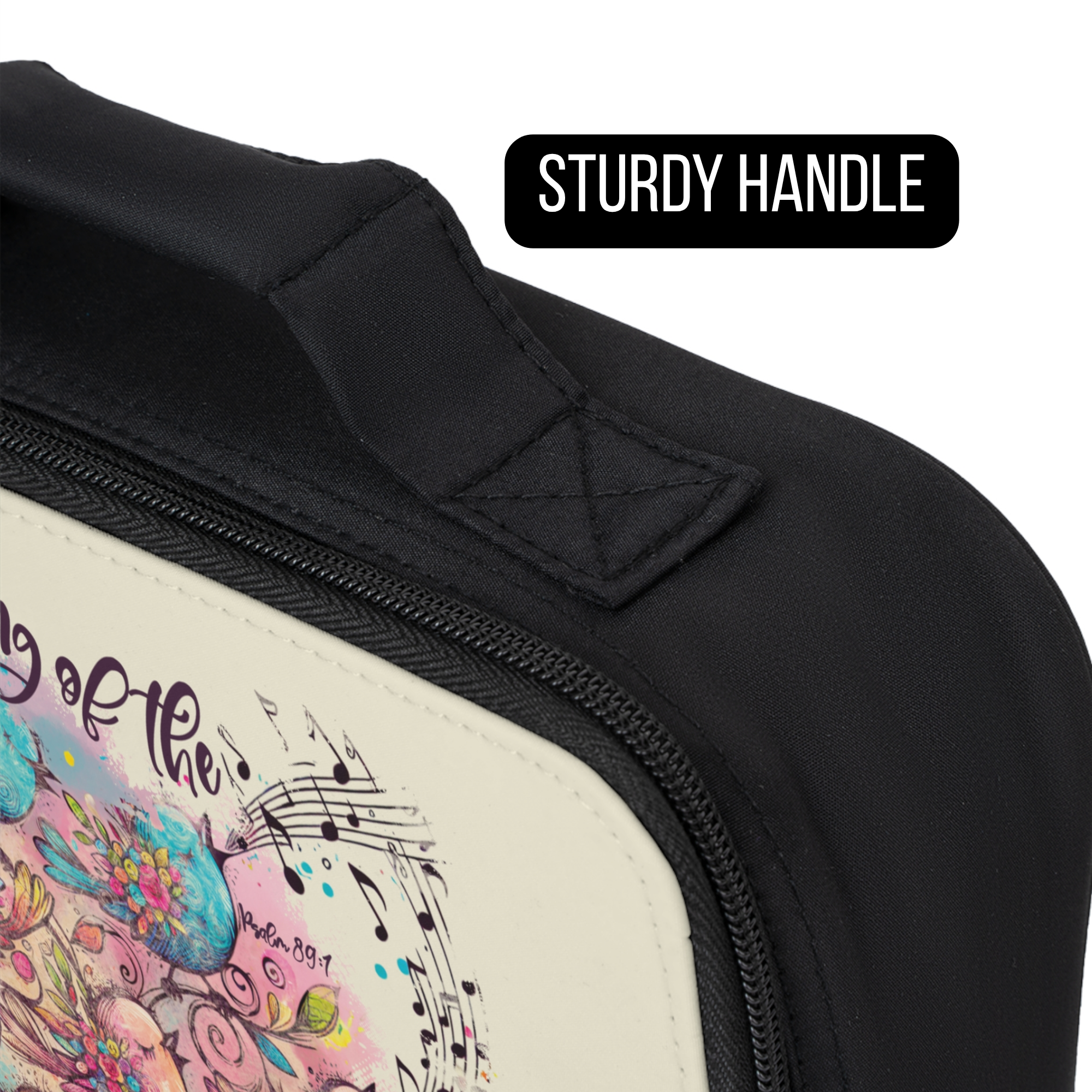 Close-up of a bag with a colorful design and text, highlighting the sturdy handle.