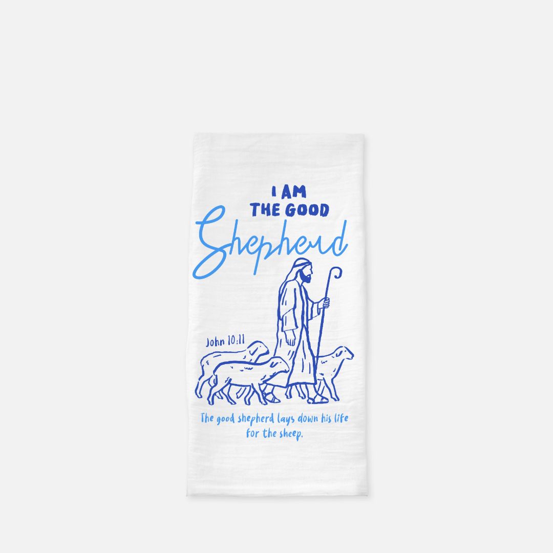 White tea towel with blue illustration of a shepherd and text on a white background