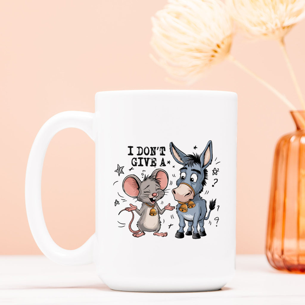 White mug with cartoon mouse and donkey design on a light pink background
